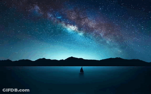 A Sailboat Is In The Middle Of A Lake Under A Starry Sky GIF