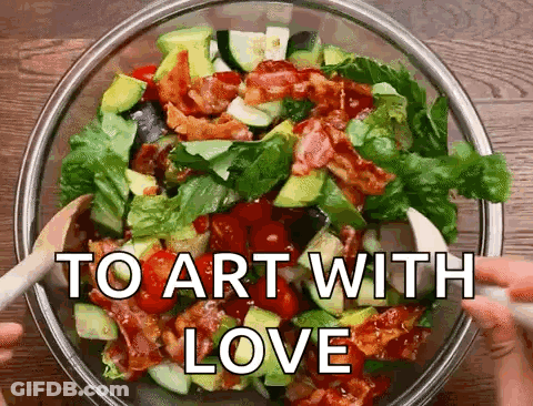 A Salad In A Bowl With The Words " To Art With Love " Above It GIF