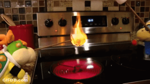 A Samsung Stove With A Marshmallow Being Cooked On It GIF