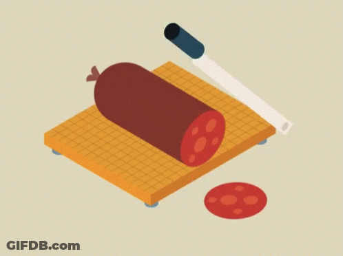 A Sausage Is Being Sliced On A Cutting Board By A Knife GIF