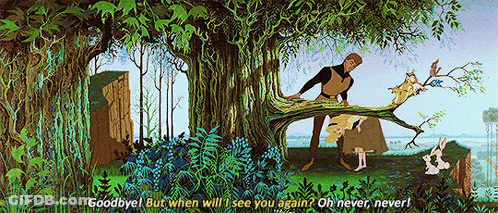 A Scene From The Movie Sleeping Beauty With A Man Standing On A Tree Branch GIF