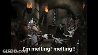 A Scene From The Movie Wizard Of Oz With The Words I 'M Melting Melting !! GIF