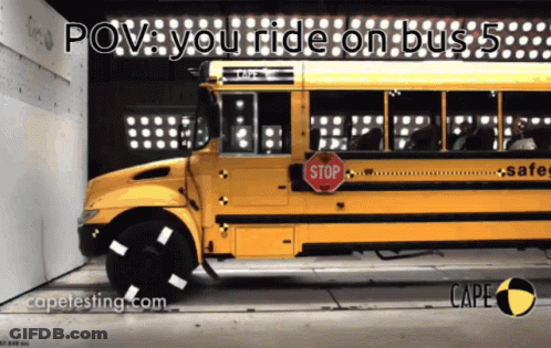A School Bus With A Stop Sign On It GIF