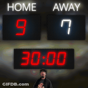 A Scoreboard Shows That The Home Team Is Leading The Away Team 9 To 7 GIF