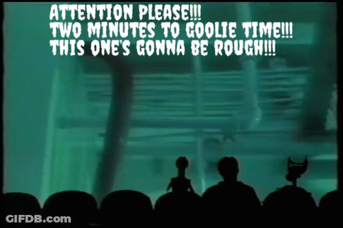 A Screen Says " Attention Please Two Minutes To Goolie Time This One 'S Gonna Be Rough " GIF