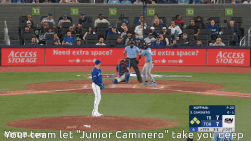 A Screen Shot Of A Stadium With The Words " Your Team Let Junior Caminero Take You Deeper " At The Bottom GIF