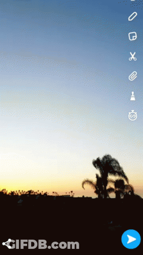 A Screen Shot Of A Sunset With Icons On It GIF