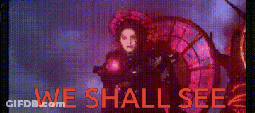 A Screen That Says We Shall See With A Woman In The Background GIF