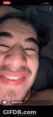 A Screenshot Of A Man 'S Face With The Time Of 8:49 On The Bottom GIF