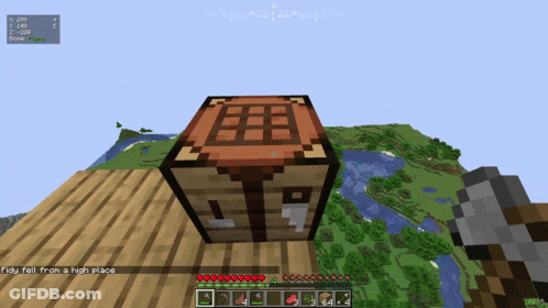 A Screenshot Of A Minecraft Game Shows A Large Wooden Block With A Red Top GIF