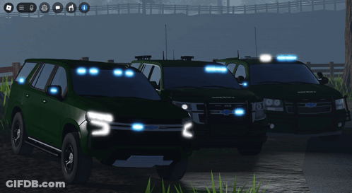 A Screenshot Of A Video Game Shows Three Cars With Lights On And One Has The Word Sheriff On The Front GIF