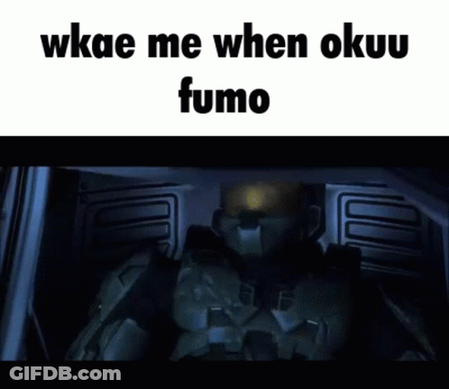 A Screenshot Of A Video With The Words `` Wkae Me When Okuu Fumo '' Written On It . GIF