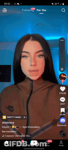 A Screenshot Of A Woman 'S Face On A Phone With A Following For You Button GIF