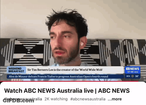 A Screenshot Of Abc News Australia Showing A Man On The Screen GIF