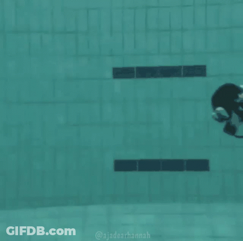 A Scuba Diver Is Swimming In A Pool With The Hashtag @Jadearhannah GIF