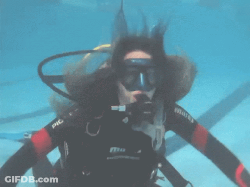 A Scuba Diver Wearing A Mares Wet Suit GIF