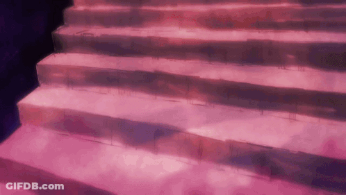 A Set Of Pink Stairs With A Dark Purple Background GIF