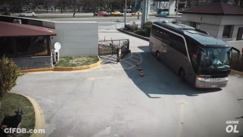 A Setra Bus Is Parked In Front Of A Building With Above Ol Written On The Bottom GIF