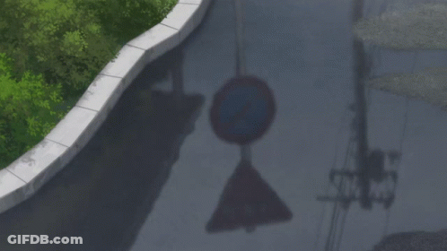A Shadow Of A No Parking Sign On The Ground GIF