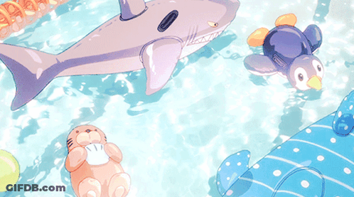 A Shark And A Penguin Float In A Swimming Pool GIF