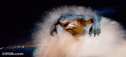 A Shark Is Jumping Out Of The Water With A City In The Background GIF