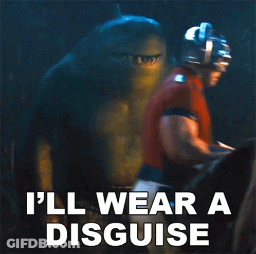 A Shark With The Words " I 'Ll Wear A Disguise " Written On It GIF