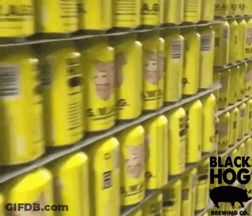A Shelf Full Of Yellow Cans Of Black Hog Brewing Co. Beer GIF
