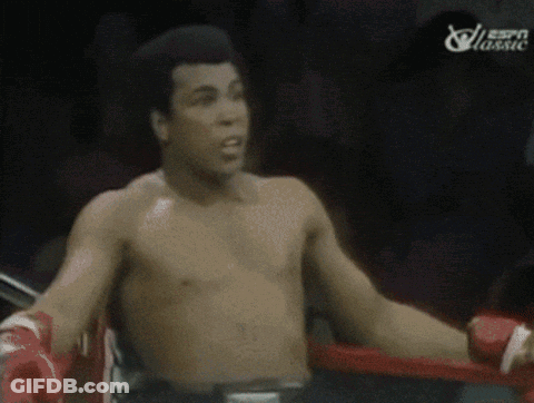A Shirtless Boxer In A Boxing Ring With Espn Classic Written On The Bottom GIF