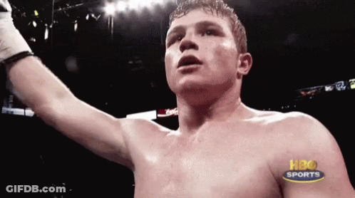 A Shirtless Boxer In A Boxing Ring With Hbo Sports Written On His Chest GIF