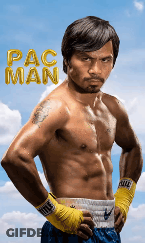 A Shirtless Boxer Stands With His Hands On His Hips In Front Of A Pac Man Balloon GIF