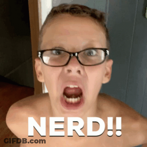 A Shirtless Boy Wearing Glasses Is Making A Funny Face And The Word Nerd Is On The Bottom GIF