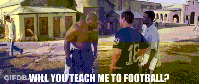 A Shirtless Football Player With The Number 18 On His Jersey GIF