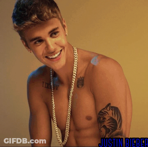 A Shirtless Justin Bieber With A Tiger Tattoo GIF