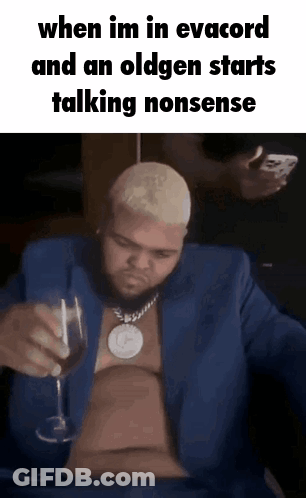 Shirtless Man In Blue Suit Holding Wine GIF