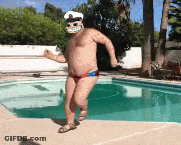 A Shirtless Man In A Captain 'S Hat Is Dancing Near A Pool GIF