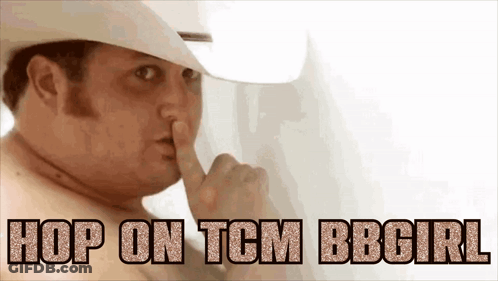 A Shirtless Man In A Cowboy Hat Is Covering His Mouth With His Finger And Says Hop On Tcm Bbcirl GIF