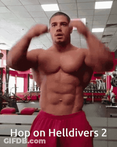 A Shirtless Man In A Gym With The Words Hop On Helldivers 2 Below Him GIF