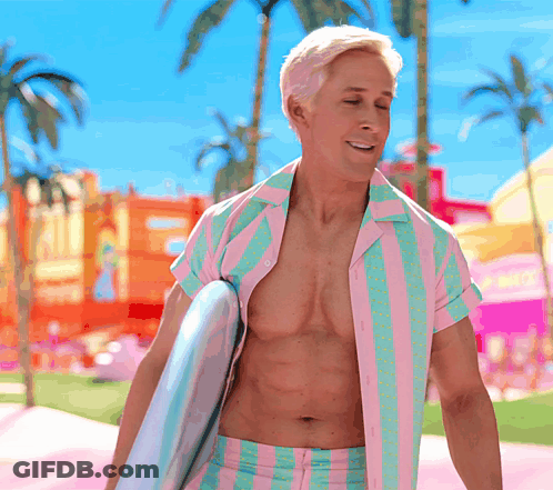 A Shirtless Man In A Pink And Green Striped Shirt Holds A Surfboard GIF