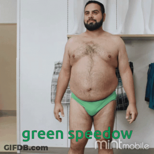 A Shirtless Man In Green Underwear With The Words Green Speedow Mintmobile On The Bottom GIF