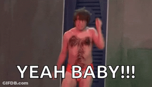 A Shirtless Man In Red Underwear Is Standing In Front Of A Door And Shouting . GIF