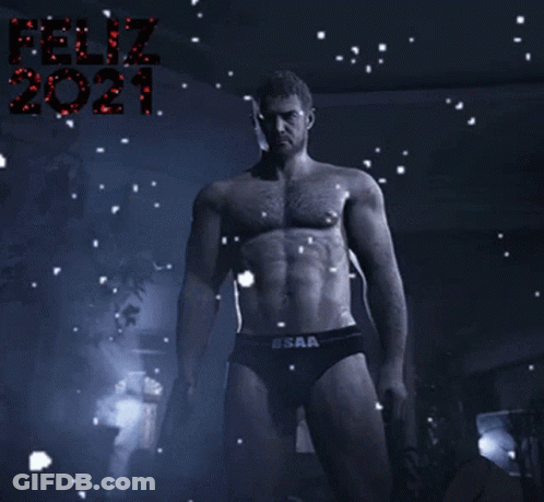A Shirtless Man In Underwear Stands In Front Of Feliz 2021 GIF