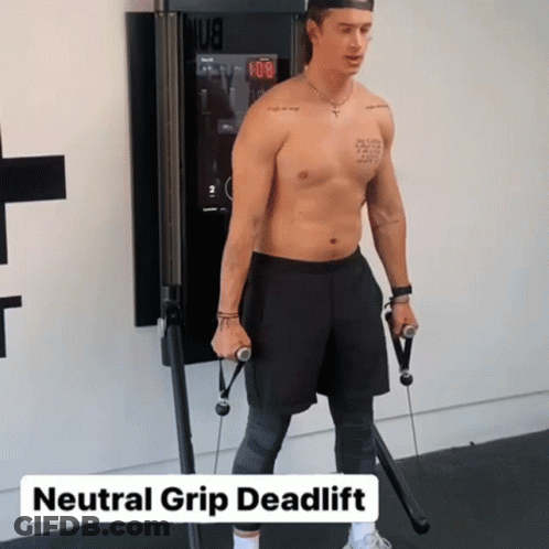 A Shirtless Man Is Doing A Neutral Grip Deadlift On A Machine GIF