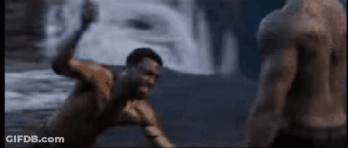 A Shirtless Man Is Fighting Another Shirtless Man In A Video Game . GIF