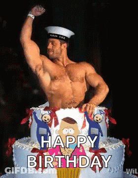 A Shirtless Man Is Flexing His Muscles In Front Of A Birthday Cake That Says Happy Birthday . GIF