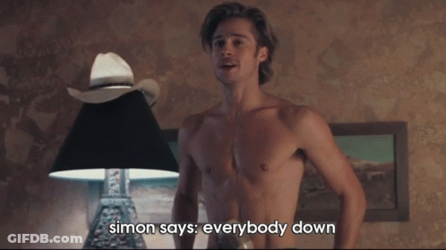 A Shirtless Man Is Holding A Bottle And Says " Everybody Down " GIF