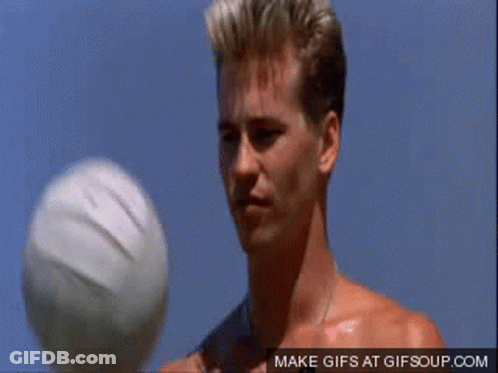 A Shirtless Man Is Holding A Volleyball In His Hand With A Make Gifs At Gifsoup.com Watermark Above His Head GIF