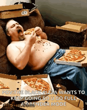A Shirtless Man Is Laying On A Couch Eating Pizza GIF