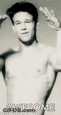 A Shirtless Man Is Making A Peace Sign With His Hands . GIF
