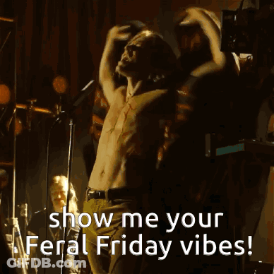 A Shirtless Man Is Singing Into A Microphone With The Words Show Me Your Feral Friday Vibes GIF