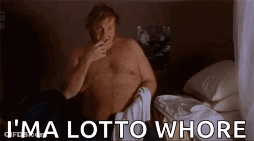 A Shirtless Man Is Sitting On A Bed Smoking A Cigarette And Saying `` I 'Ma Lotto Whore '' . GIF
